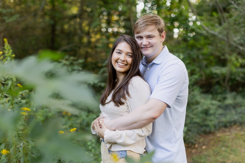 Fall time Signal Mountain engagements in tall yellow flowers by Chattanooga photographer Daisy Moffatt