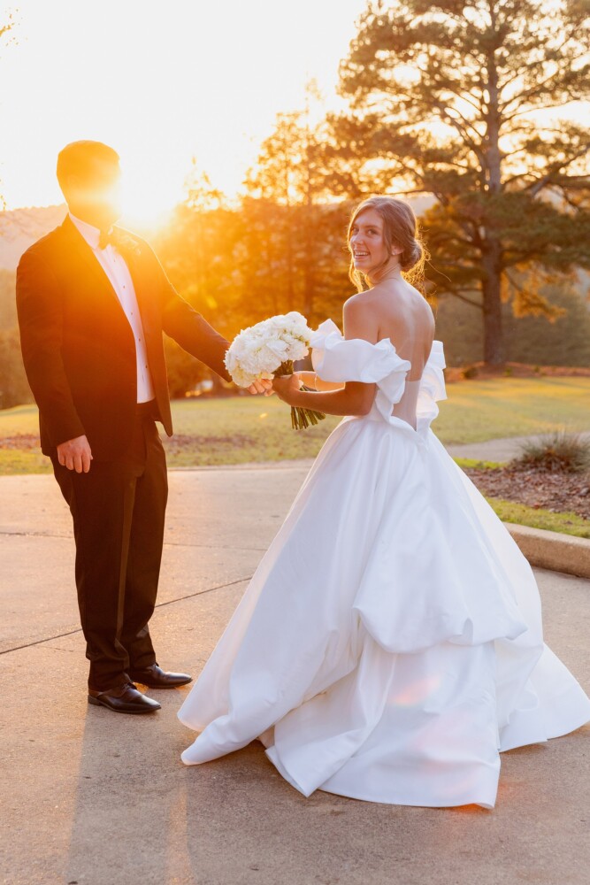 The farm golf club wedding with soft white flowers and black tie celebration