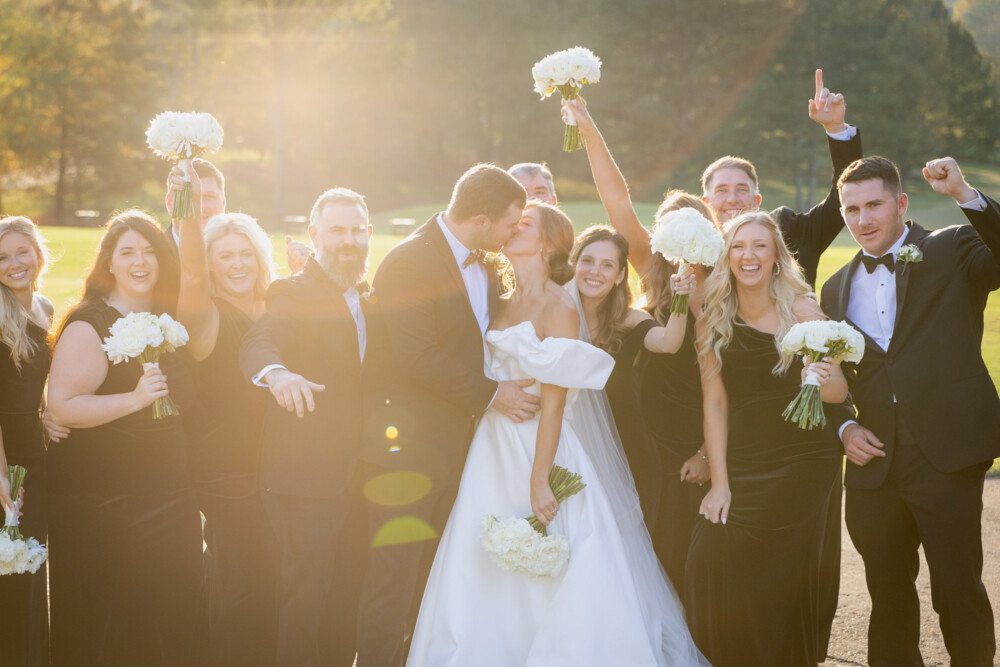 The farm golf club wedding with soft white flowers and black tie celebration